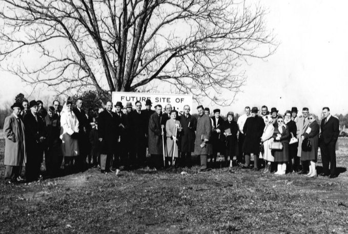 Historical Picture of people posed with shovels